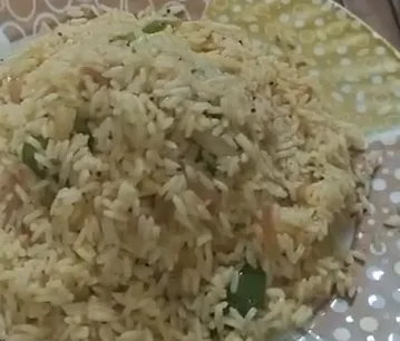 A plate of cooked Sona Masoori rice prepared as pulao
